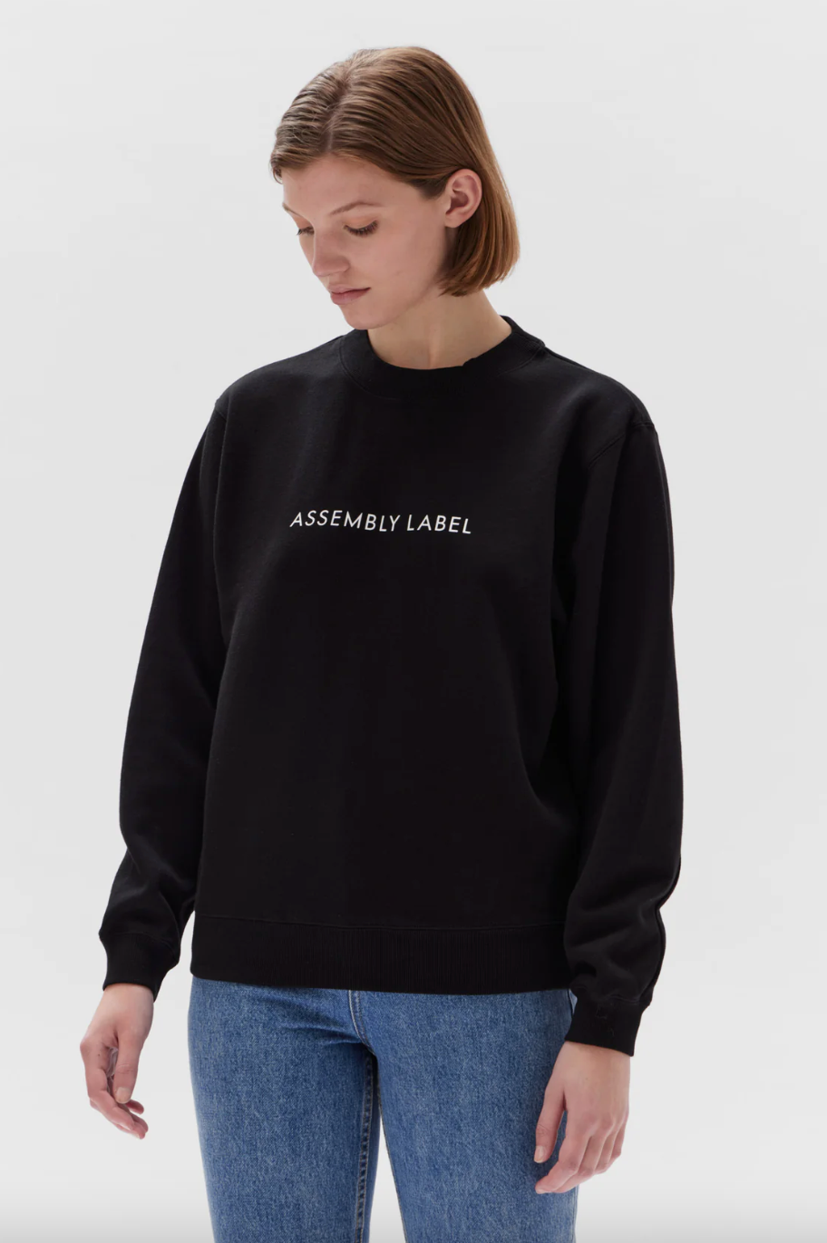 Assembly label hotsell white jumper