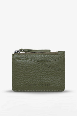 Green leather wallet with a zipper on a white background